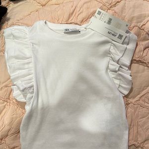 Zara white ruffle shirt.